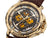 Gold color case with Arabic numbers on it and a engraved flat crown.